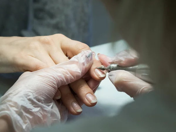 Hardware manicure. Treatment of nail cutters.