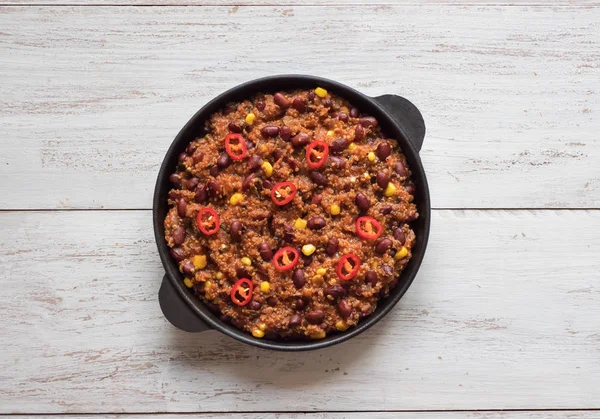 Red chili beans. Hot red chili in the pan.