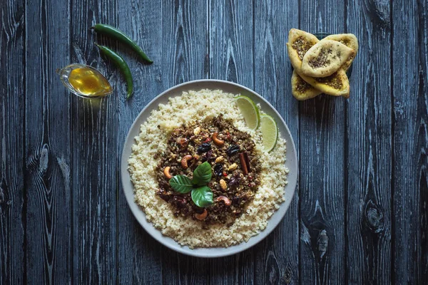 Moroccan spiced mince with couscous. Top view. — Stock Photo, Image