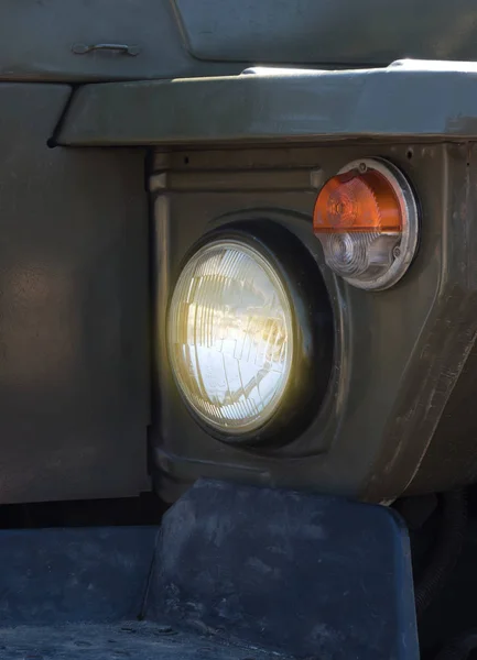 Headlight with turn signal of heavy military vehicles