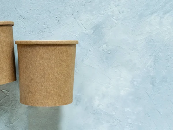 Cardboard cup on a grey background. — ストック写真