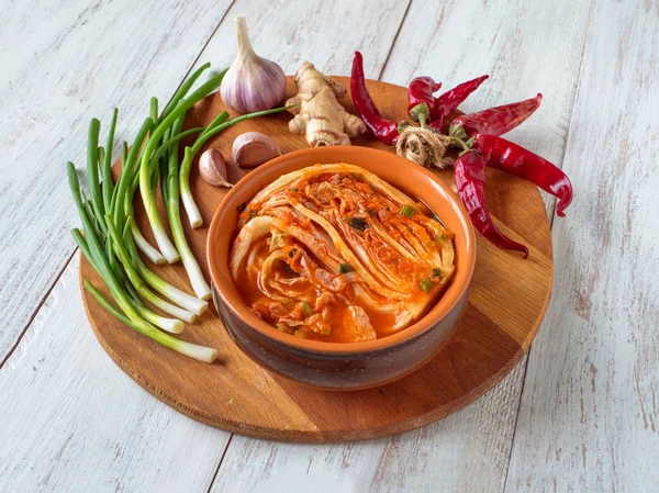 Kimchi cabbage in a bowl on wooden background — Stock Image Kimchi cabbage in a bowl on wooden background Stock Picture