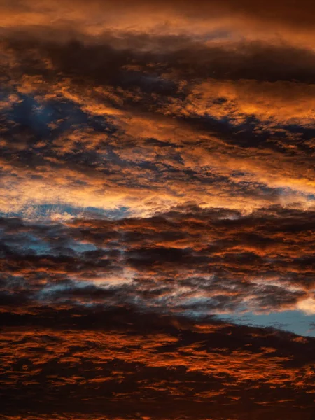 Abstract texture of a dramatic red sky with clouds — Stock Photo, Image