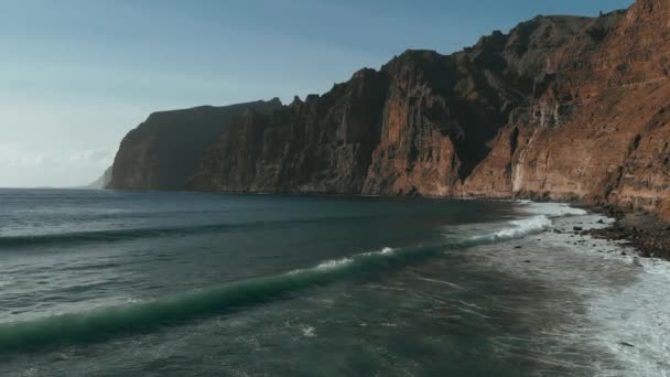 Top view of the coast of the island and the rocks in the Ataltic Ocean in Los Gigantes, Tenerife, Canary islands, Spain — Stock Video