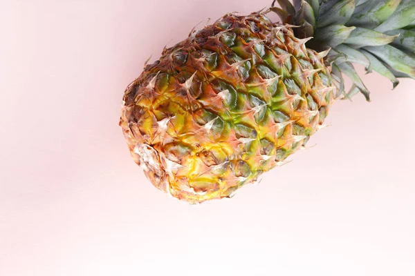 Pineapple on a pink background, tropical fruit top view, pineapple in pop art style, vegetarian food in minimalism style, copy space