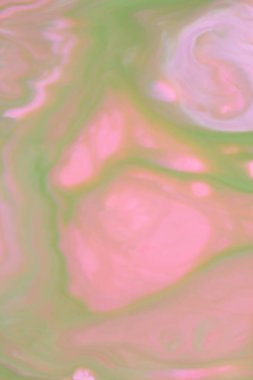 Pembe holografik arka planı yeşil, pembe su damlacıkları, çok renkli desen, süt renklerde gıda, su, tasarımcı için boş renk doku