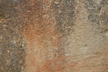 Doku duvar eski. Prag'da antik bir tapınak yüzeyine. Arka plan taş Tasarımcısı. Kahverengi tonlarında Vintage desen