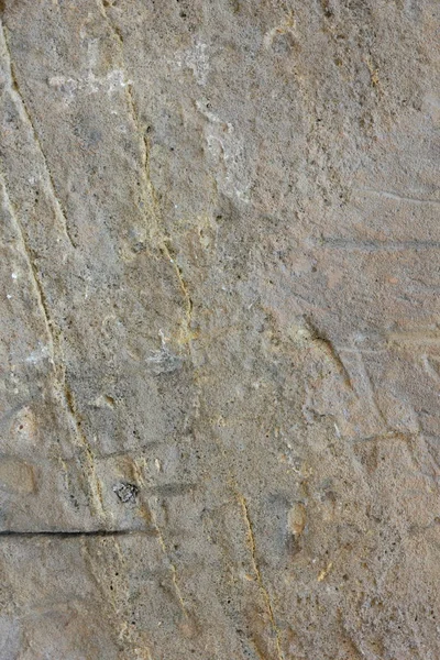 Doku duvar eski. Prag'da antik bir tapınak yüzeyine. Arka plan taş Tasarımcısı. Desen kahverengi tonlarında