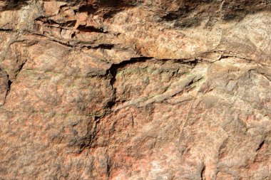 Granit doku Tasarımcısı. Granit taş yakın çekim. Arka plan doğal malzeme. Eski zamanların kayalık kayalar. Doğal desen