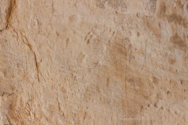 Doku duvar eski. Prag'da antik bir tapınak yüzeyine. Arka plan taş Tasarımcısı. Kahverengi tonlarında Vintage desen