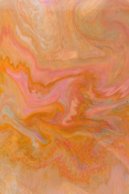 Sanat sıvı. Çok renkli arka plan üzerinde sıvı. Turuncu spot renkleri. Bulanık desen. Holografik doku