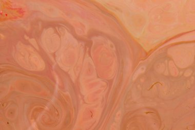 Sanat sıvı. Çok renkli arka plan üzerinde sıvı. Turuncu spot renkleri. Bulanık desen. Holografik doku