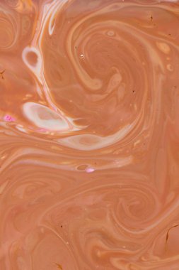 Sanat sıvı. Çok renkli arka plan. Turuncu spot renkleri. Bulanık desen. Sıvı üzerinde holografik doku