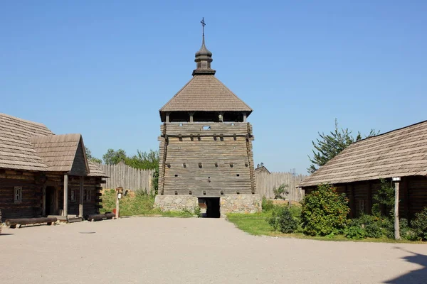 Wooden buildings. Wooden houses of Cossacks. Outbuildings at Zaporizhzhya Sich on island of Khortytsya in Ukraine. Medieval way of life — Stock Image Wooden Buildings Wooden Houses Cossacks Outbuildings Zaporizhzhya Sich Island Khortytsya Royalty Free Stock Photos