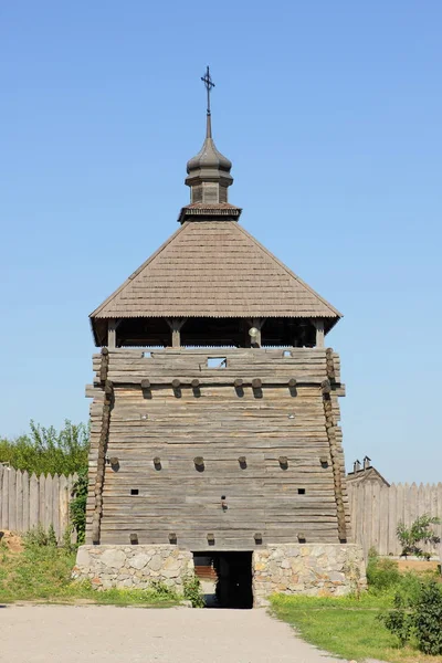 Wooden buildings. Wooden houses of Cossacks. Outbuildings at Zaporizhzhya Sich on island of Khortytsya in Ukraine. Medieval way of life — Stock Image Wooden Buildings Wooden Houses Cossacks Outbuildings Zaporizhzhya Sich Island Khortytsya Royalty Free Stock Images