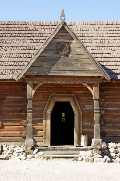 Wooden buildings. Wooden houses of Cossacks. Outbuildings at Zaporizhzhya Sich on island of Khortytsya in Ukraine. Medieval way of life — Stock Image Wooden Buildings Wooden Houses Cossacks Outbuildings Zaporizhzhya Sich Island Khortytsya Stock Photo