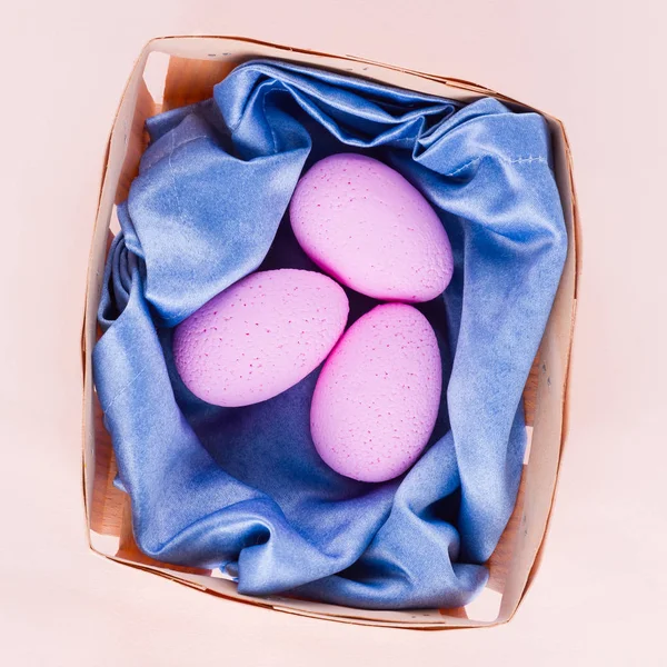 Pink Easter Eggs Blue Napkin Wooden Basket Easter Minimal Concept — Stock Photo, Image