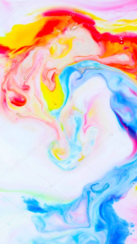 Multicolored background from paints on liquid. Fluid art with different colors. Screen saver. Bright pattern on liquid. Colored paint stains in pop art style