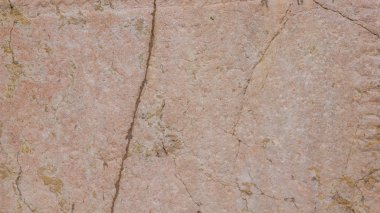 Eski duvarın arka planı. Taş yüzeyin dokusu. Retro tarzısoyut arka plan. Katı malzemenin kahverengi yüzeyi