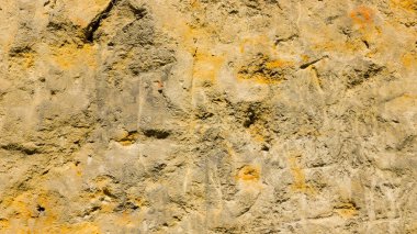 Eski taş duvarın arka planı. Taş yüzeyin dokusu. Eski Avrupa şehrinde tuğla işi. Retro stilinde desen