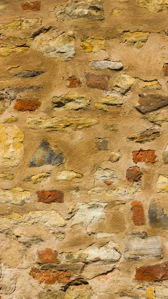 旧石墙的背景 石头表面的纹理 旧欧洲城市的砖砌 复古风格的图案 — 图库照片