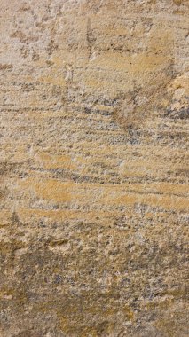 Eski duvarın arka planı. Taş yüzeyin dokusu. Retro tarzısoyut arka plan. Katı malzemenin kahverengi yüzeyi