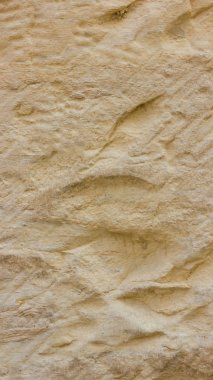 Eski duvarın arka planı. Taş yüzeyin dokusu. Retro tarzısoyut arka plan. Katı malzemenin kahverengi yüzeyi