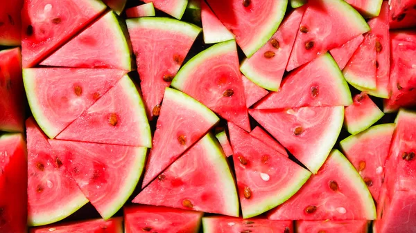 Watermelon pattern. Sliced watermelon with seed. Summer fruit background. Flat lay. Top view