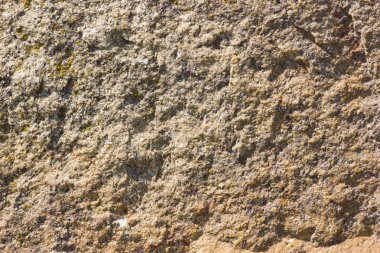 Granit in arka planı. Granit taş dokusu. Pürüzlü yüzey deseni. Kahverengi taş dokusu