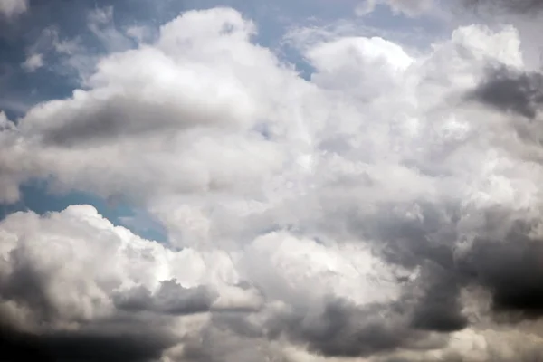 sky with white and dark clouds - background