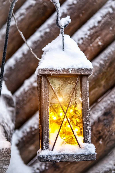 Street old lantern with a candle on the street in the winter. Festive mood. — Stock Photo, Image