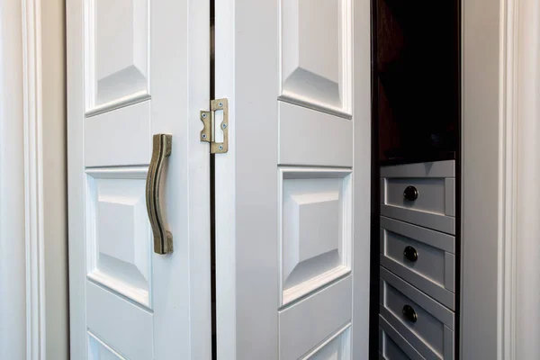 White wooden sliding door in modern house close-up