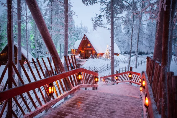 Santa claus village lapland finland. beautiful wooden bridge with lanterns — Stock Photo, Image