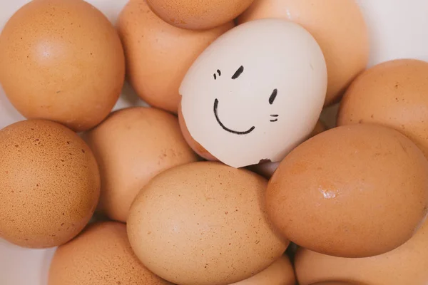 cute happy eggs smile face draw on shell