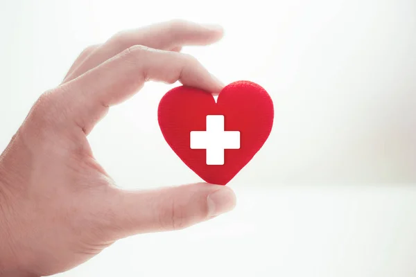 Hospital Health Care Love with Heart in Hand for Help and Donation concept — Stock Photo, Image
