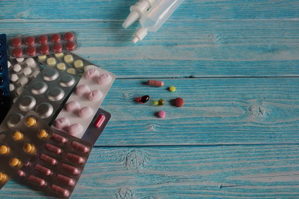 Medicines-tablets, capsules, vitamins and drops.