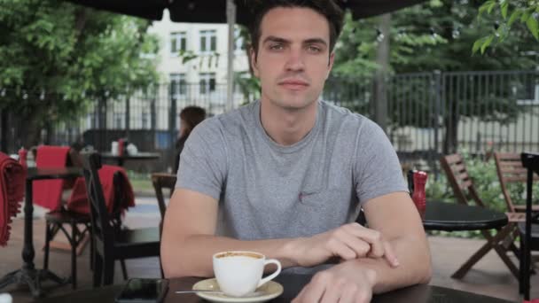 Thumbs Down by Man Sitting in Cafe Terrace Window — Stock Video