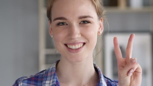 Victory Sign by Positive Young Woman — Stock Video