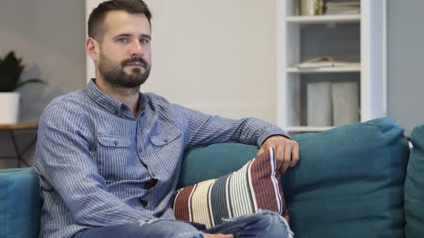 Wondering, Shocked Casually Sitting Man, Close up — Stock Video