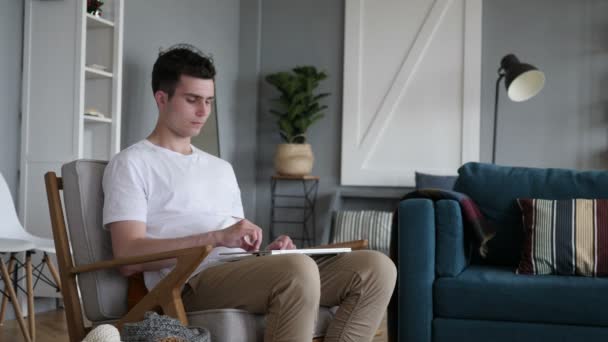 Casual Sitting Young Man Working On Laptop — Stock Video