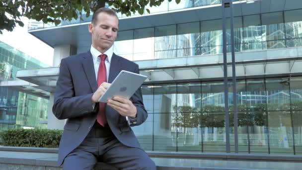 Business Woman Browsing Internet Tablet — Stock Video