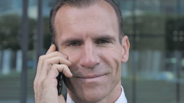 Middle Aged Businessman Talking on Phone — Stock Video