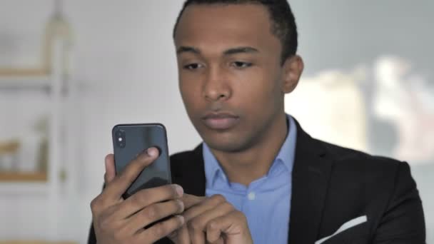 Close Casual Afro American Businessman Excited Success While Using Smartphone — Stock Video