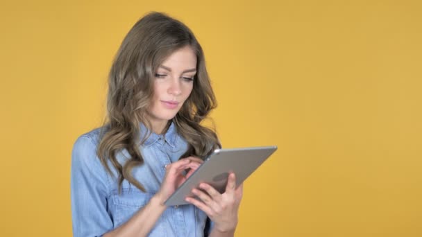 Young Girl Browsing Internet Using Tablet — Stock Video