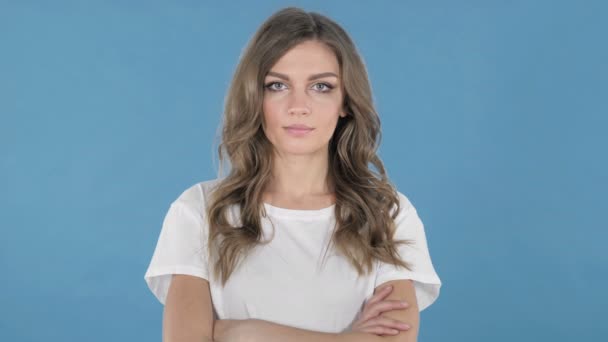 Young Girl Looking Camera Isolated Blue Background — Stock Video