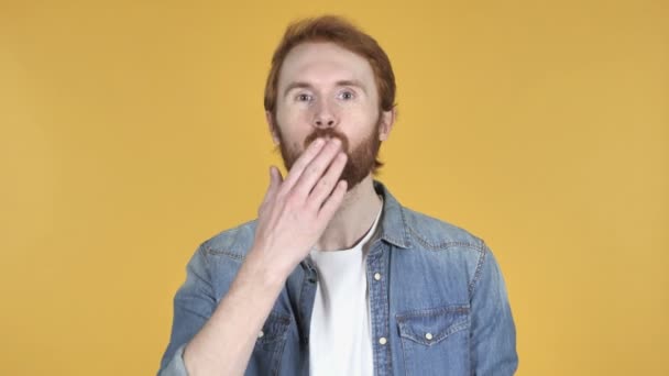 Flying Kiss Redhead Man Isolated Yellow Background — Stock Video