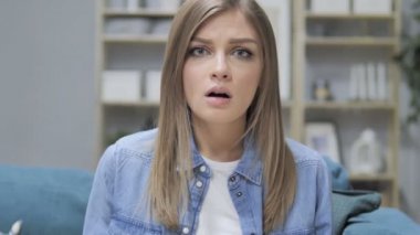 Young Girl in Creative Office Upset by Failure, Loss