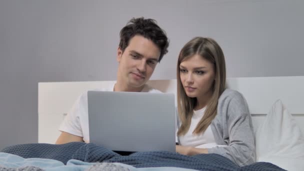 Young Couple Bed Reacting Bad News — стокове відео