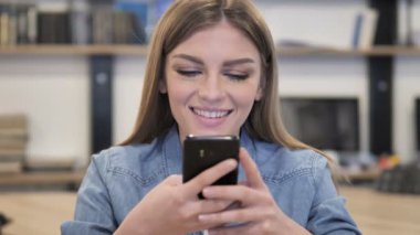 Young Girl Using Smartphone, Browsing Internet