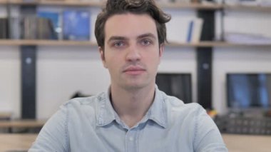 Portrait of Serious Creative Man Looking at Camera